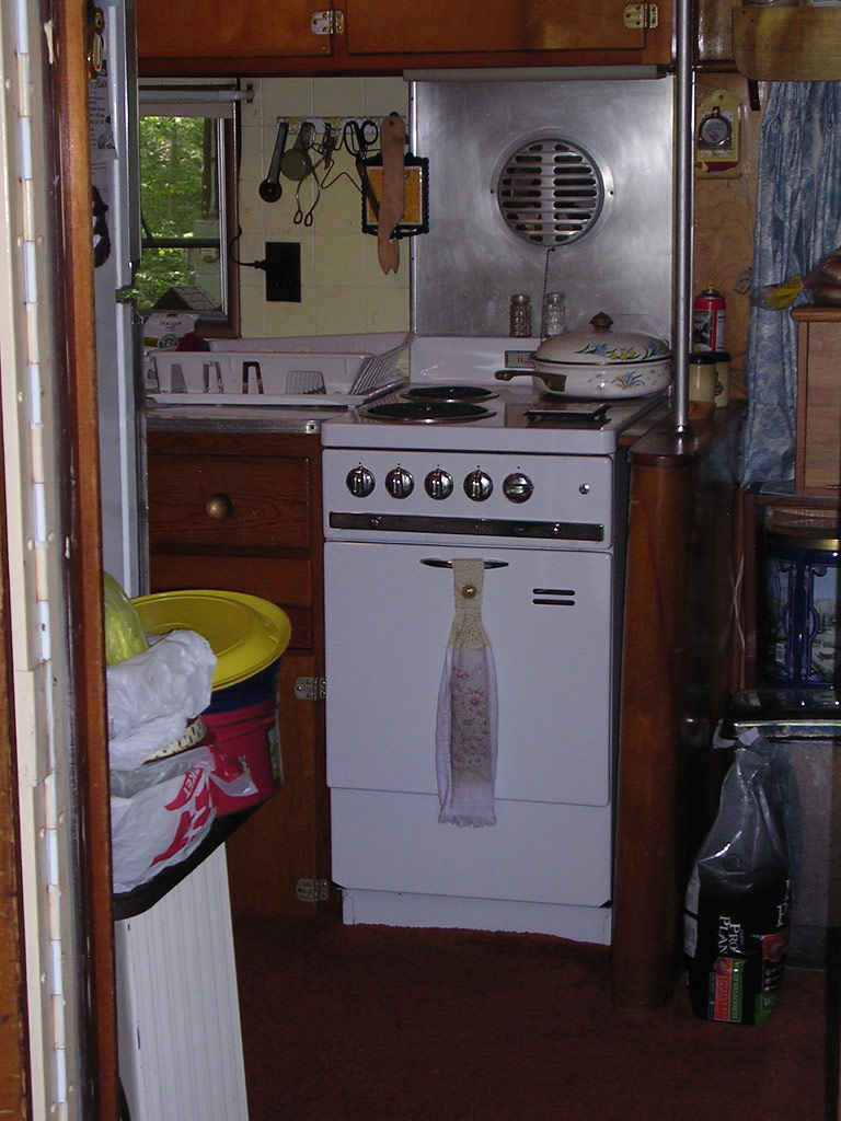 The kitchen. When you walk in this place, it's like walking into the 1950s. The Hotpoint oven rules.
