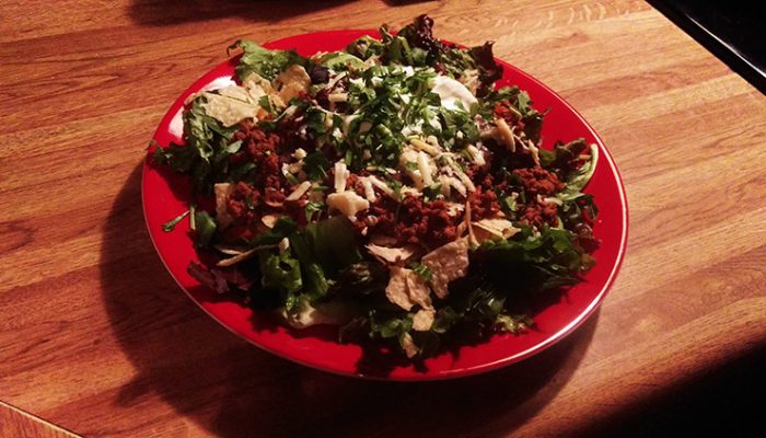 Venison Taco Salad On Red Plate